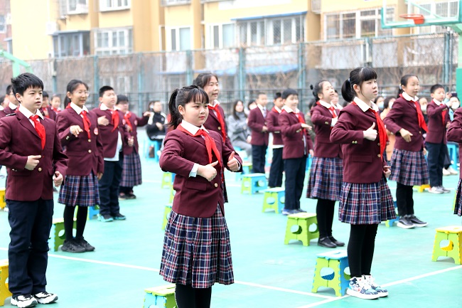 中国残联、教育部、国家语委、共青团中央联合举办队歌、团歌国家通用手语方案发布活动.jpg